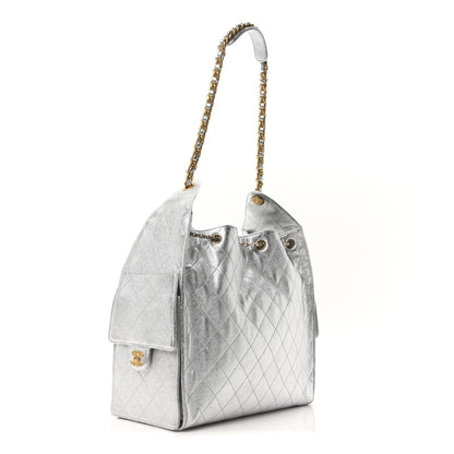 Metallic Caviar Quilted Medium Chanel 25 Handbag Silver